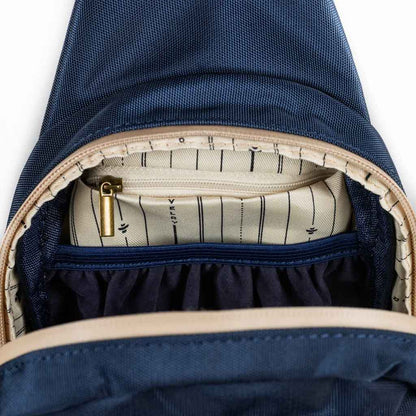 Interior view of the The Daytripper large smell proof crossbody bag showcasing its spacious compartment on a white background.