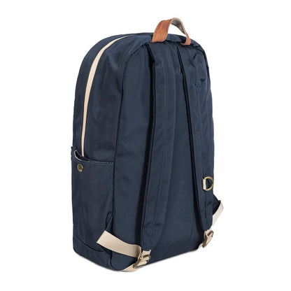 Display of the navy blue Explorer smell proof backpack on a surface, showcasing its sleek design.