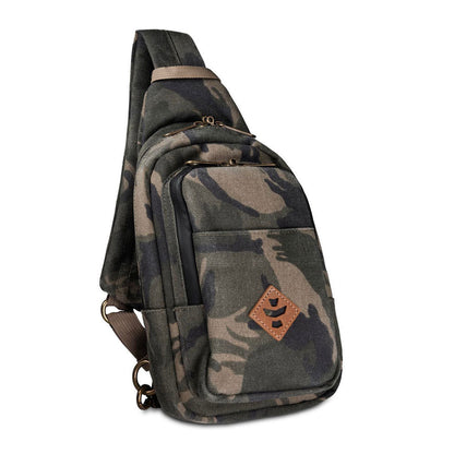 The Daytripper large smell proof crossbody bag by Revelry in a camo pattern.