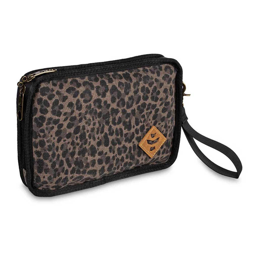 Side view of the leopard print Revelry Supply Gordo pouch with wrist strap and zippered closure.