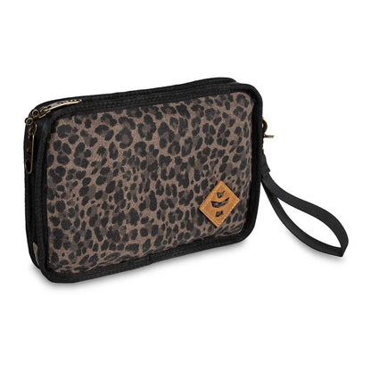 Side view of the leopard print Revelry Supply Gordo pouch with wrist strap and zippered closure.