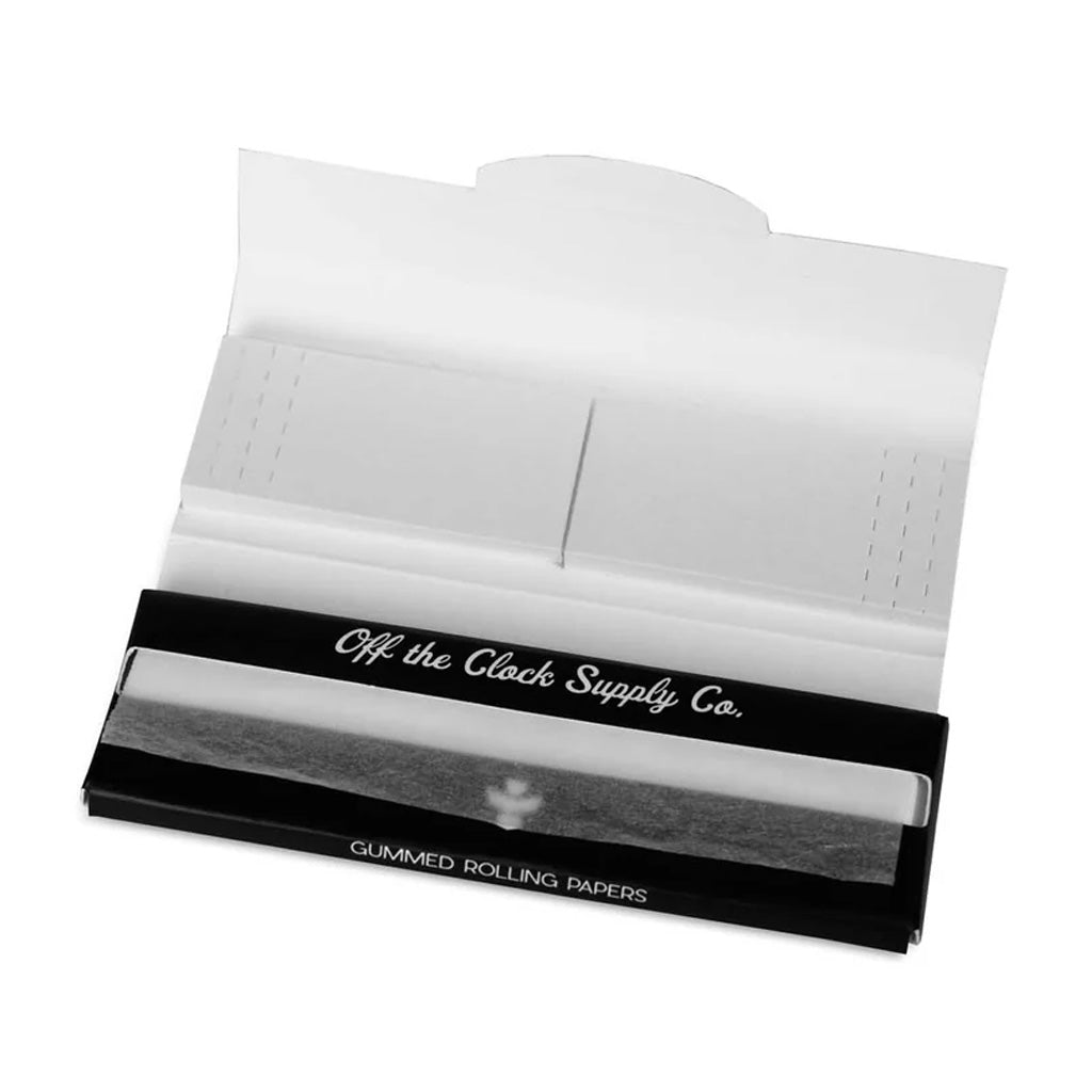 Open view showing the internal compartments of the Revelry Rolling Kit Traveler with neatly organized storage.