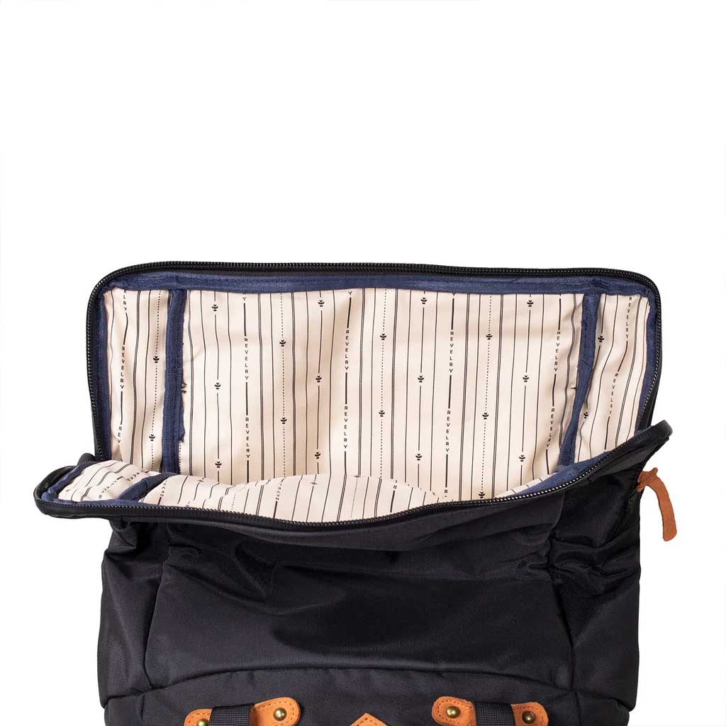 Black Revelry Supply Drifter Backpack seen from the side, showing the straps and silhouette.