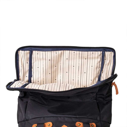 Black Revelry Supply Drifter Backpack seen from the side, showing the straps and silhouette.