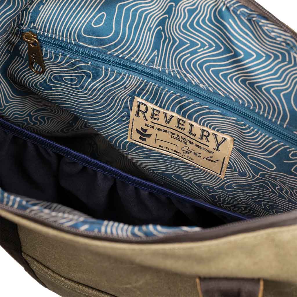 Close-up of the zipper detail on the Sage Revelry Supply Sheila Smell-Proof Travel Tote highlighting its smooth functionality.