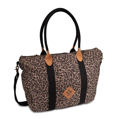Revelry Supply Sheila travel tote in a leopard pattern.