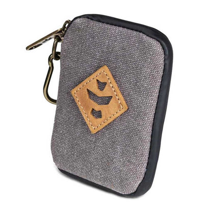 Lifestyle shot of the chillum kit in use, featuring a person holding it outdoors against a natural background.
