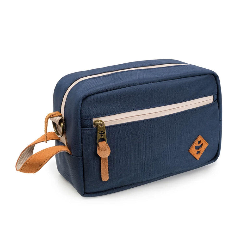 Navy blue Revelry Supply Stowaway smell proof toiletry kit in a simple product view.
