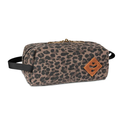 Side view of Leopard Revelry Supply The Cache Mini Smell Proof Toiletry Kit showing zipper closure.