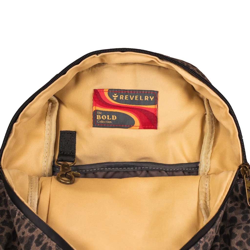 Revelry The Shorty smell proof mini backpack in leopard print.