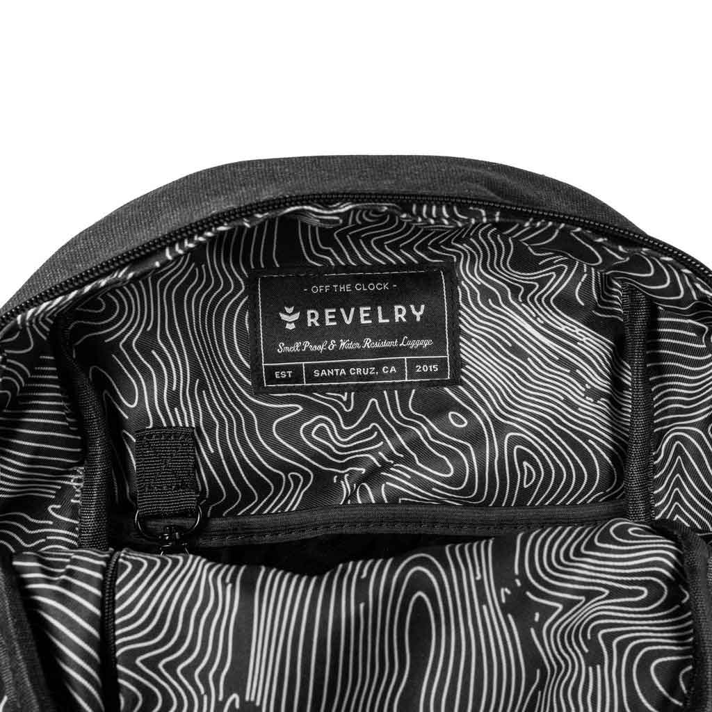 Close-up detail of the zippered compartment with an emphasis on the zipper and fabric texture.