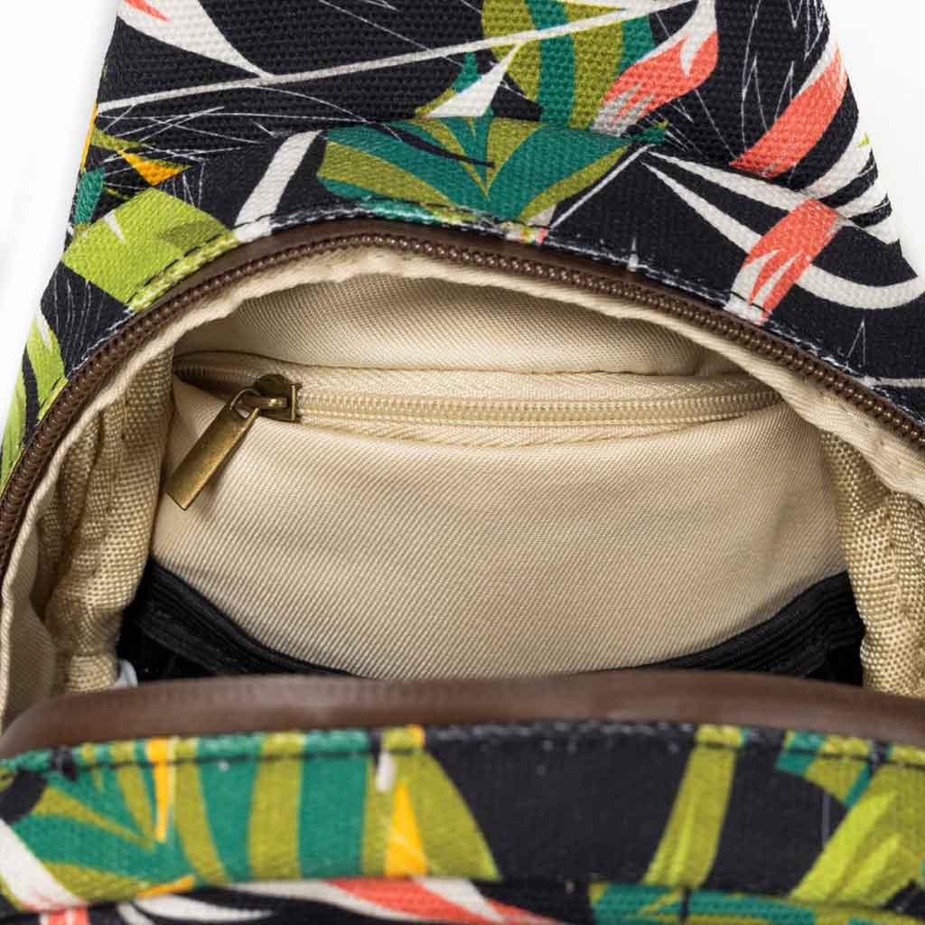 The Daytripper large smell-proof crossbody bag in Mahalo color, featuring an adjustable strap and spacious interior.