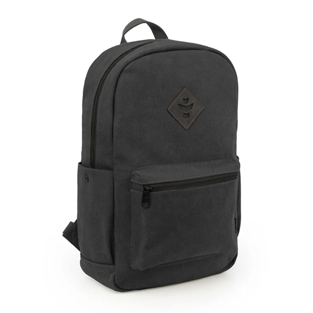 The Explorer Smell Proof Backpack shown in Smoke color with zippers and front pocket visible.